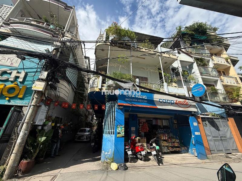 Nhà hẻm xe hơi lạc long quân, p.8, tb. dt: 6.3m x 17m, cn: 105.4m2.
