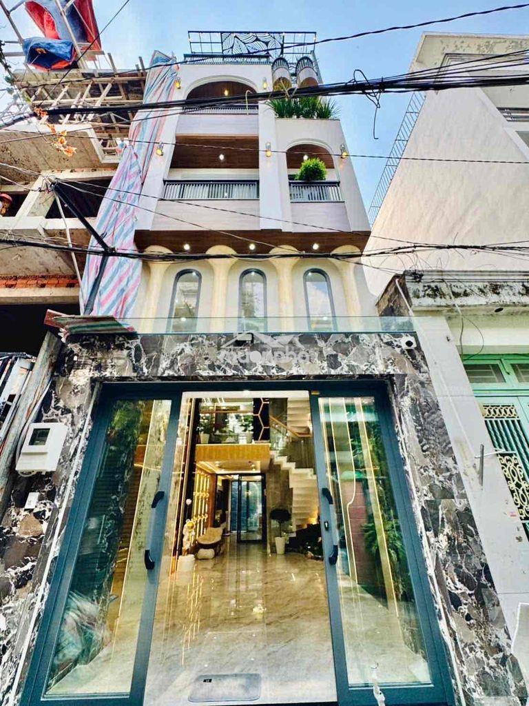 Siêu phẩm nhà mới xây có thang máy 4m x 15,2m phạm văn chiêu