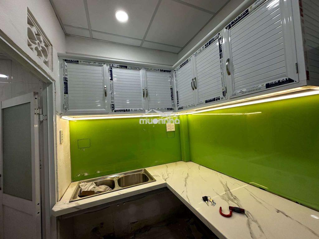 Nhà mới 100% thống nhất dt 5x6m 1 lầu 2pn 2wc - 3